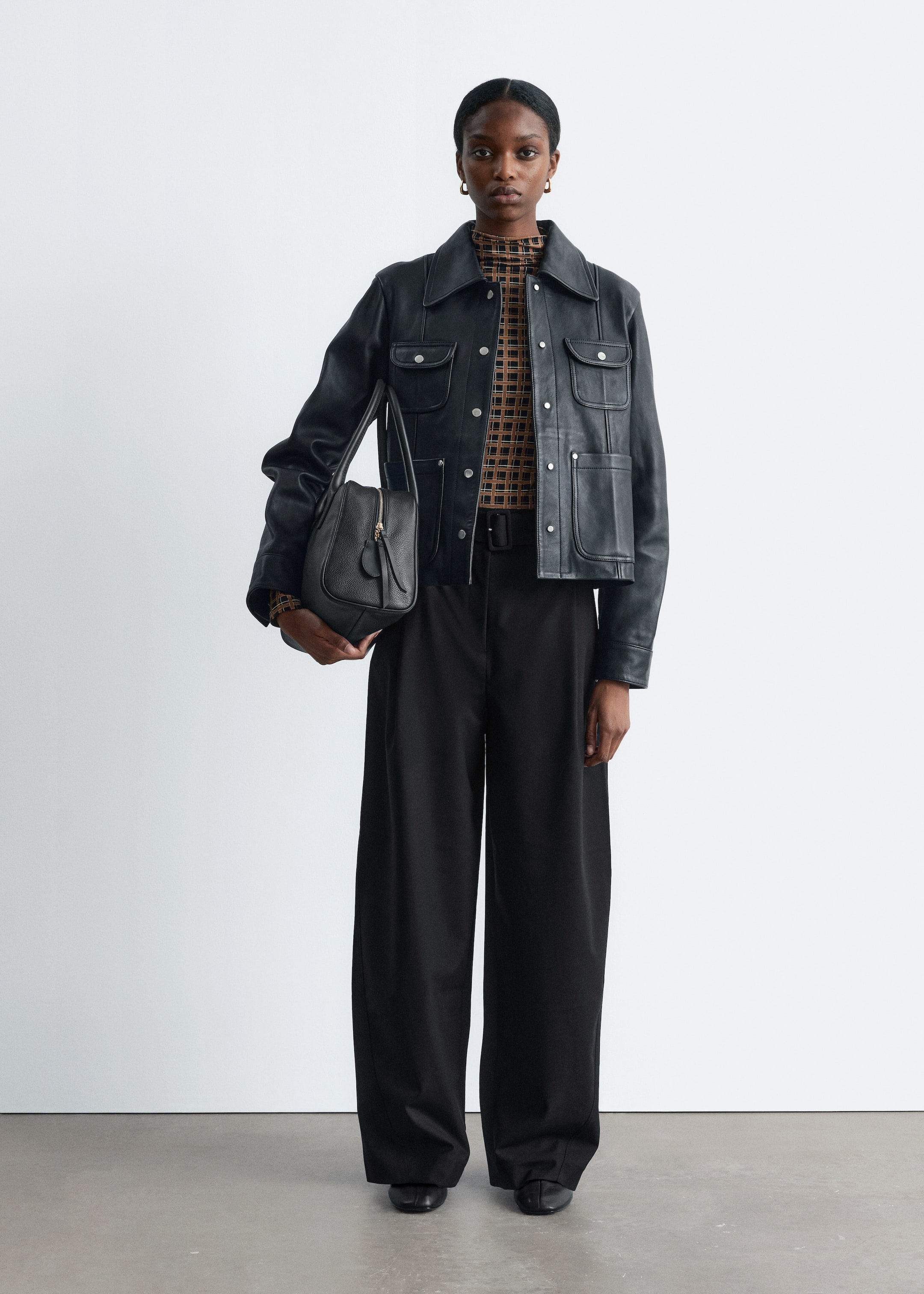 Grotere afbeelding bekijken: Elegante broek met gebogen pijpen - Zwart - DAMES | H&M NL 1