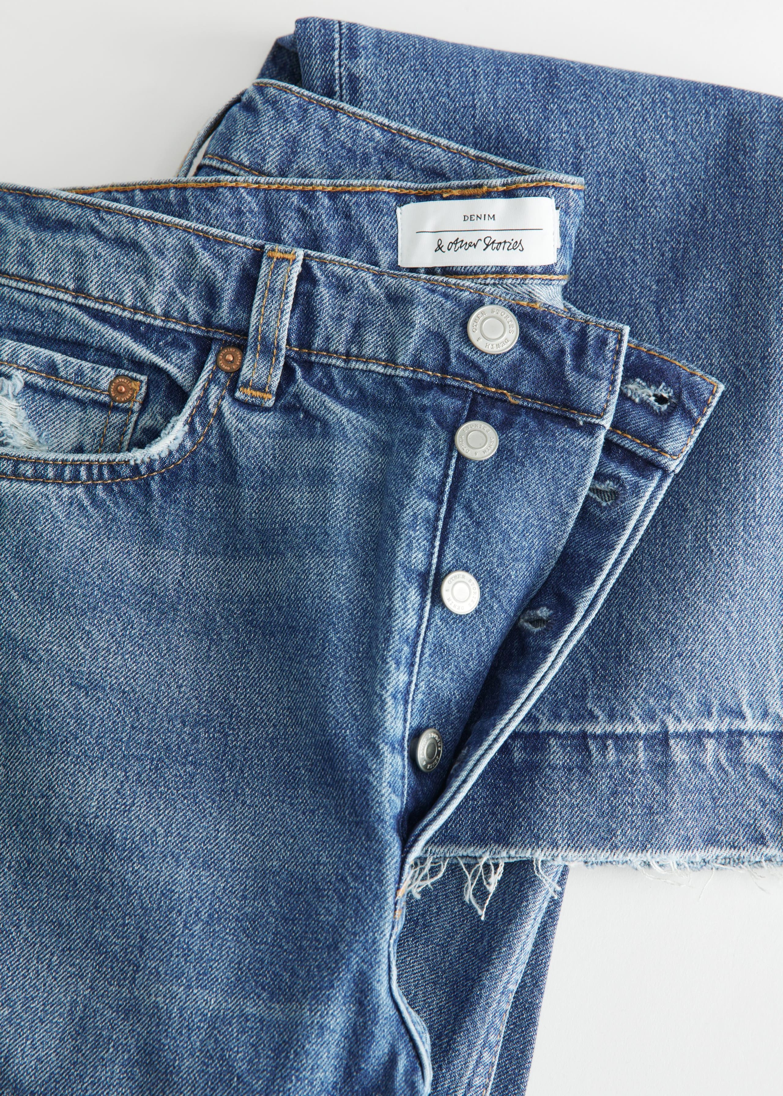 Mid Waist Tapered Jeans - {{variantName}} - Descrizione dettagliata