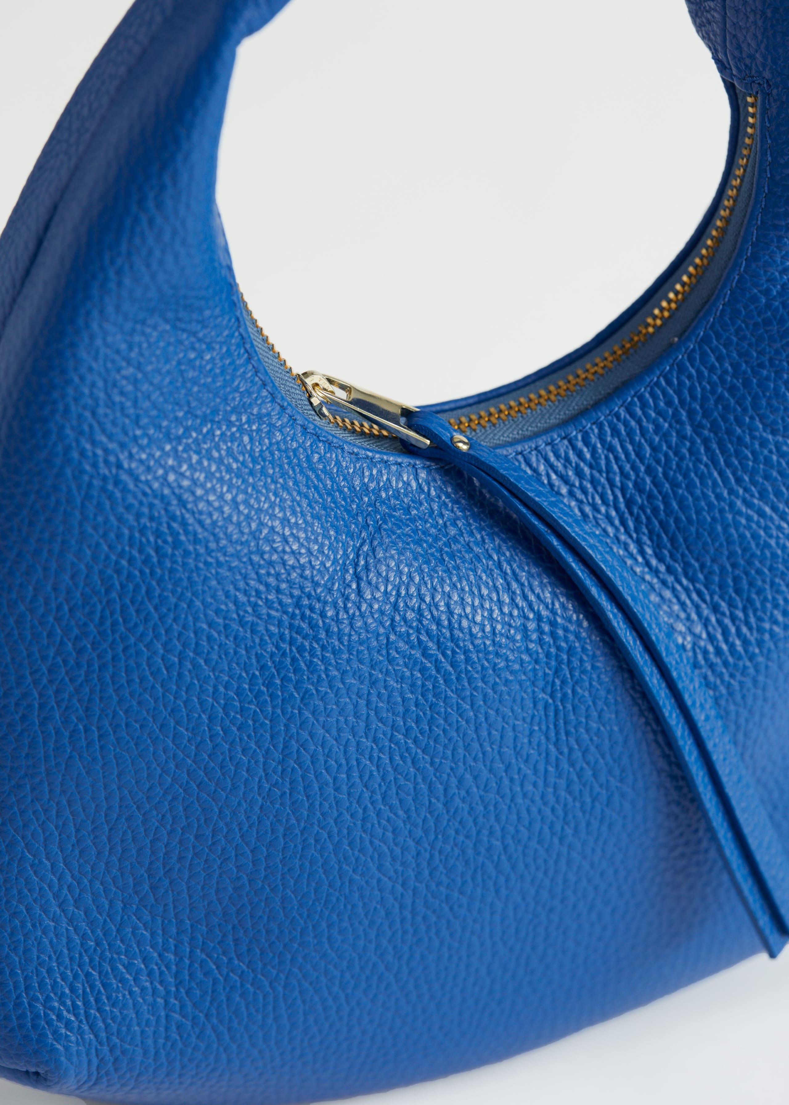 Leather Hand Bag - {{variantName}} - Descriptive Detail