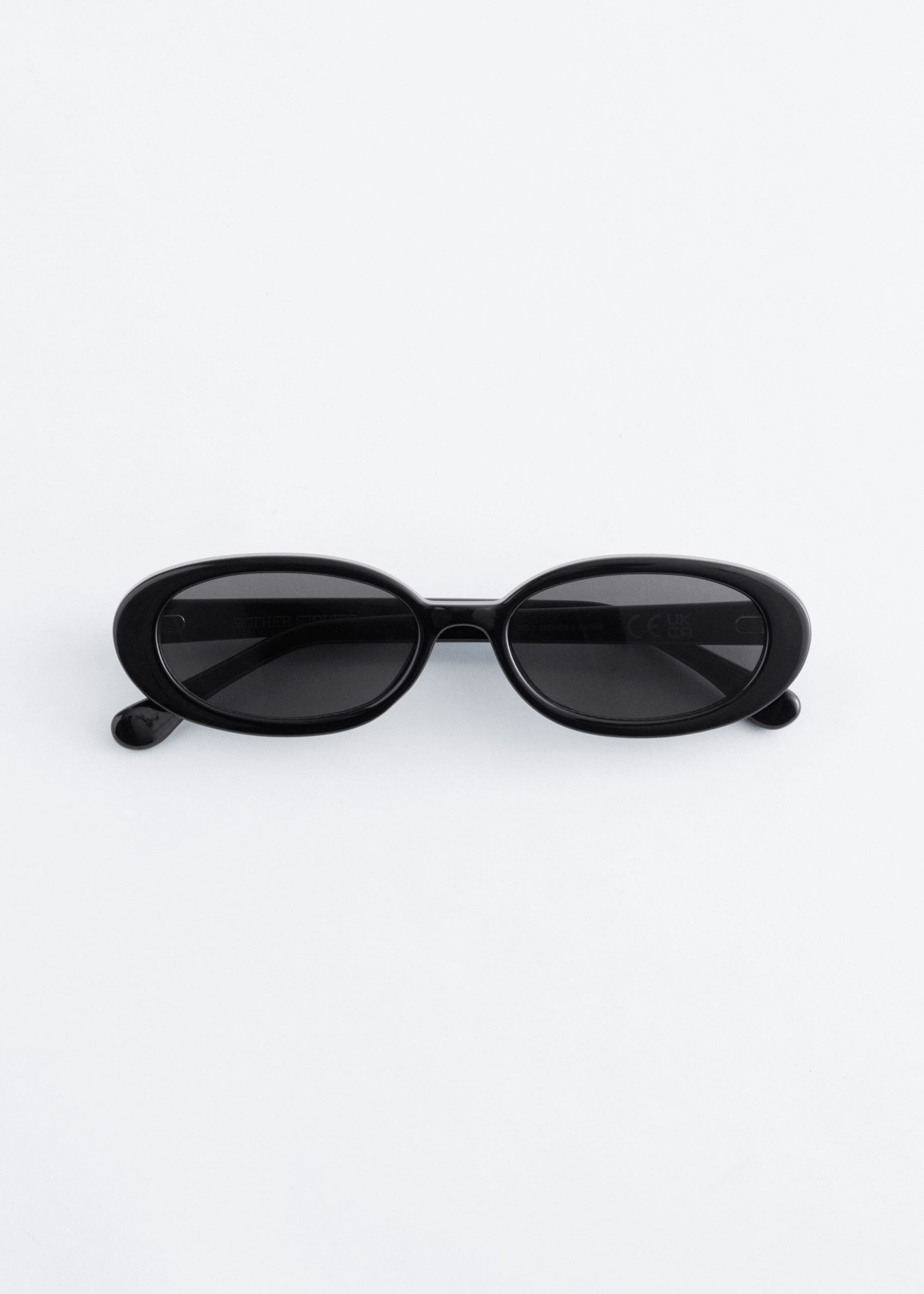 Image of Occhiali da sole slim con montatura ovale