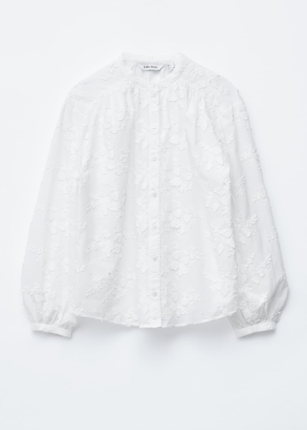 Image of Blusa voluminosa con apliques florales
