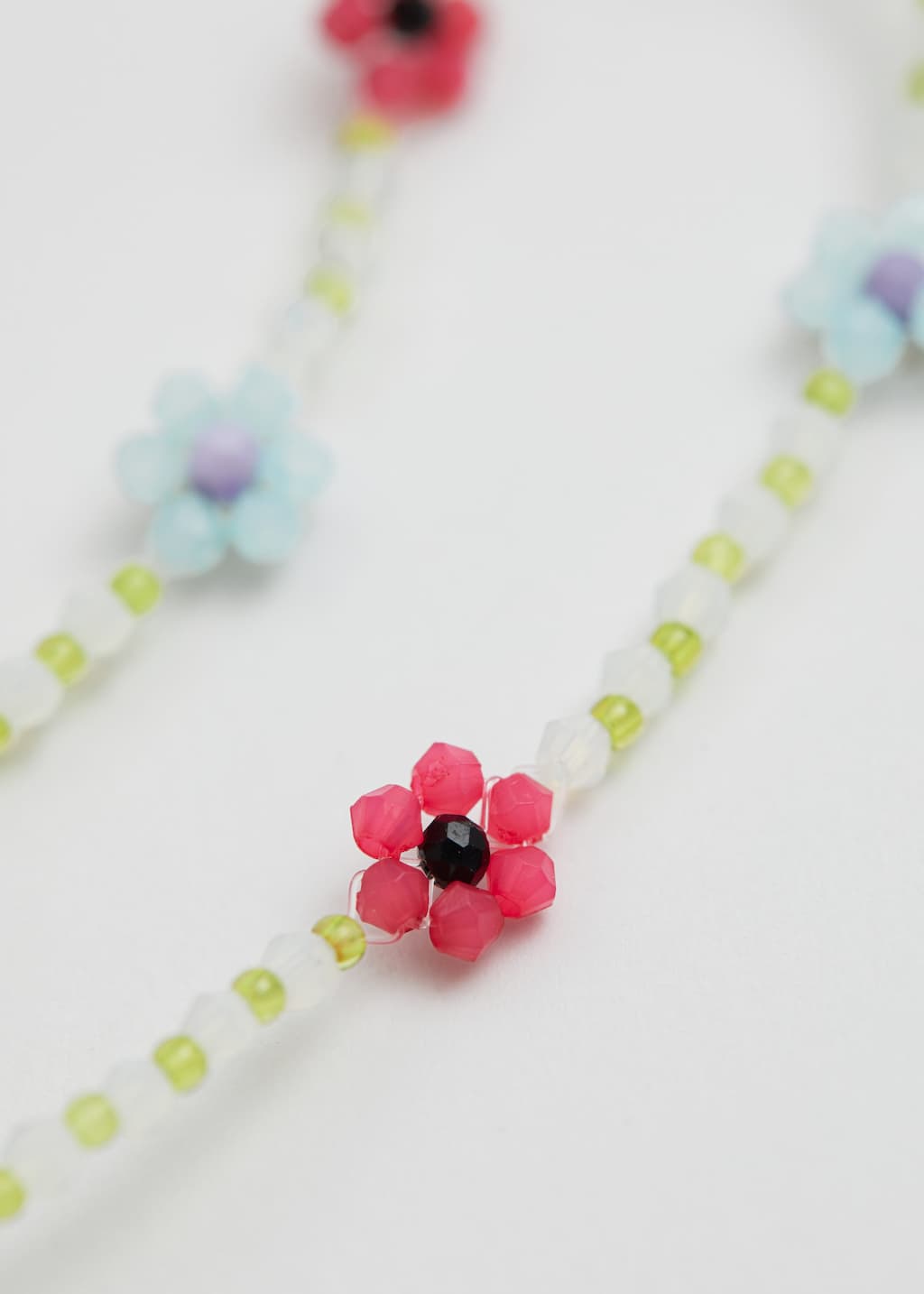 FlowerBeadedNecklace - {{variantName}} - Descrizione dettagliata