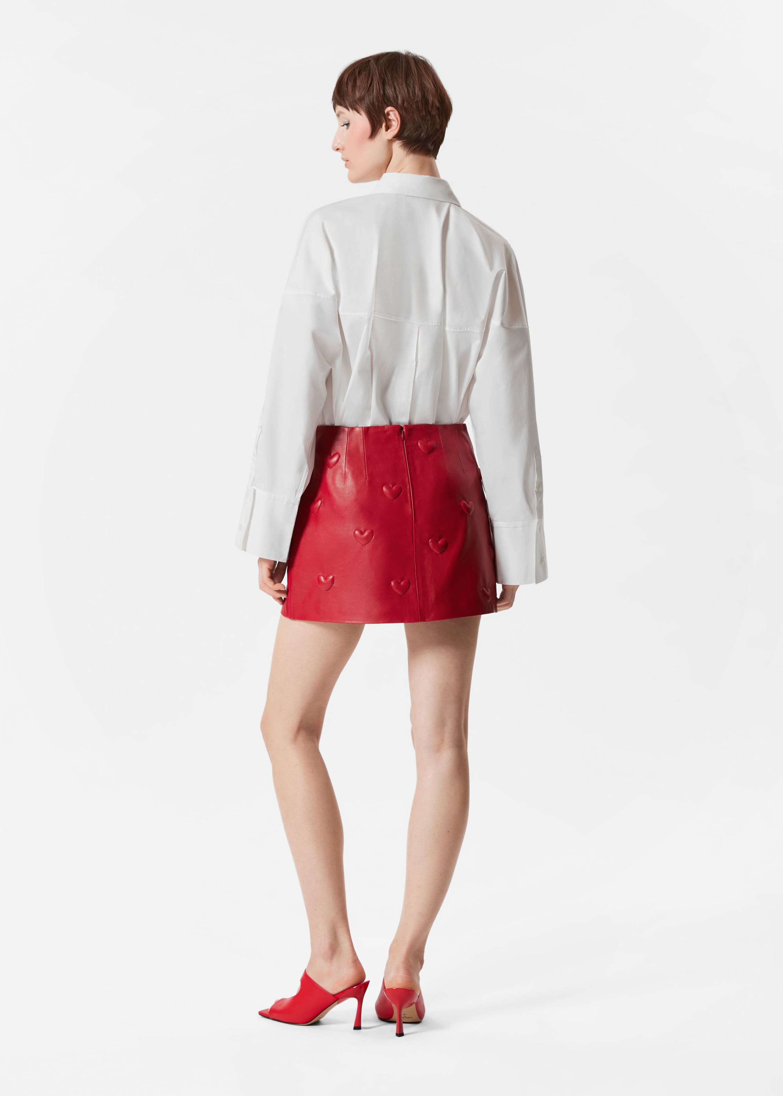 Image of Heart-Embossed Leather Mini Skirt