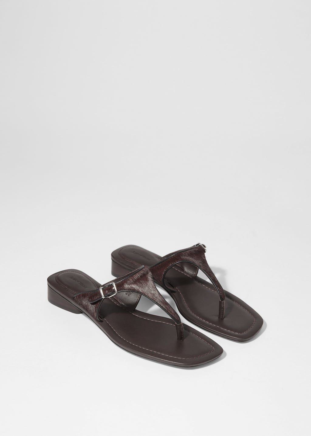 Mules en cuir à boucles