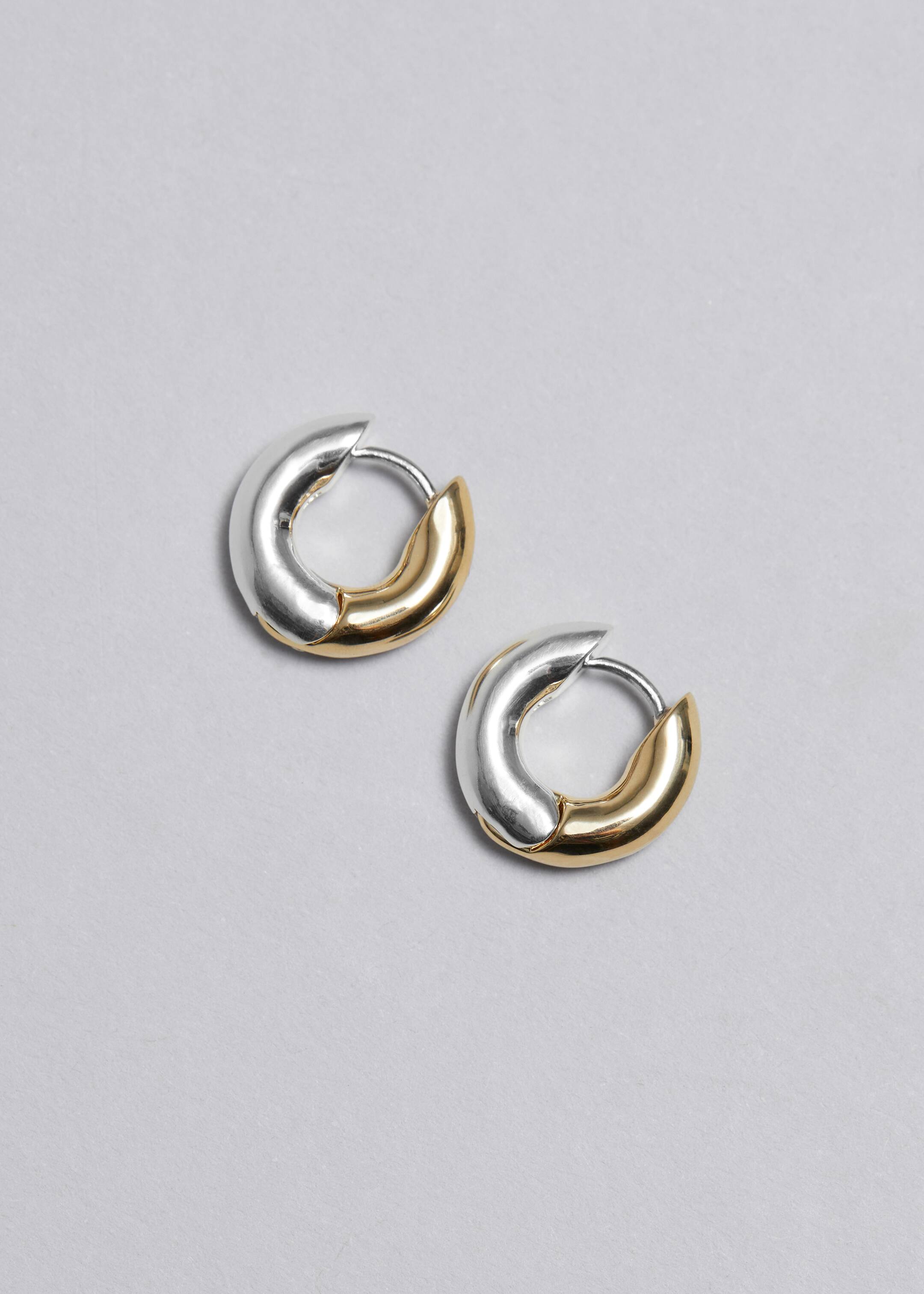 Zobacz większy obraz: Masywne kolczyki koła - Srebrny/Złoty - ONA | H&M PL 1