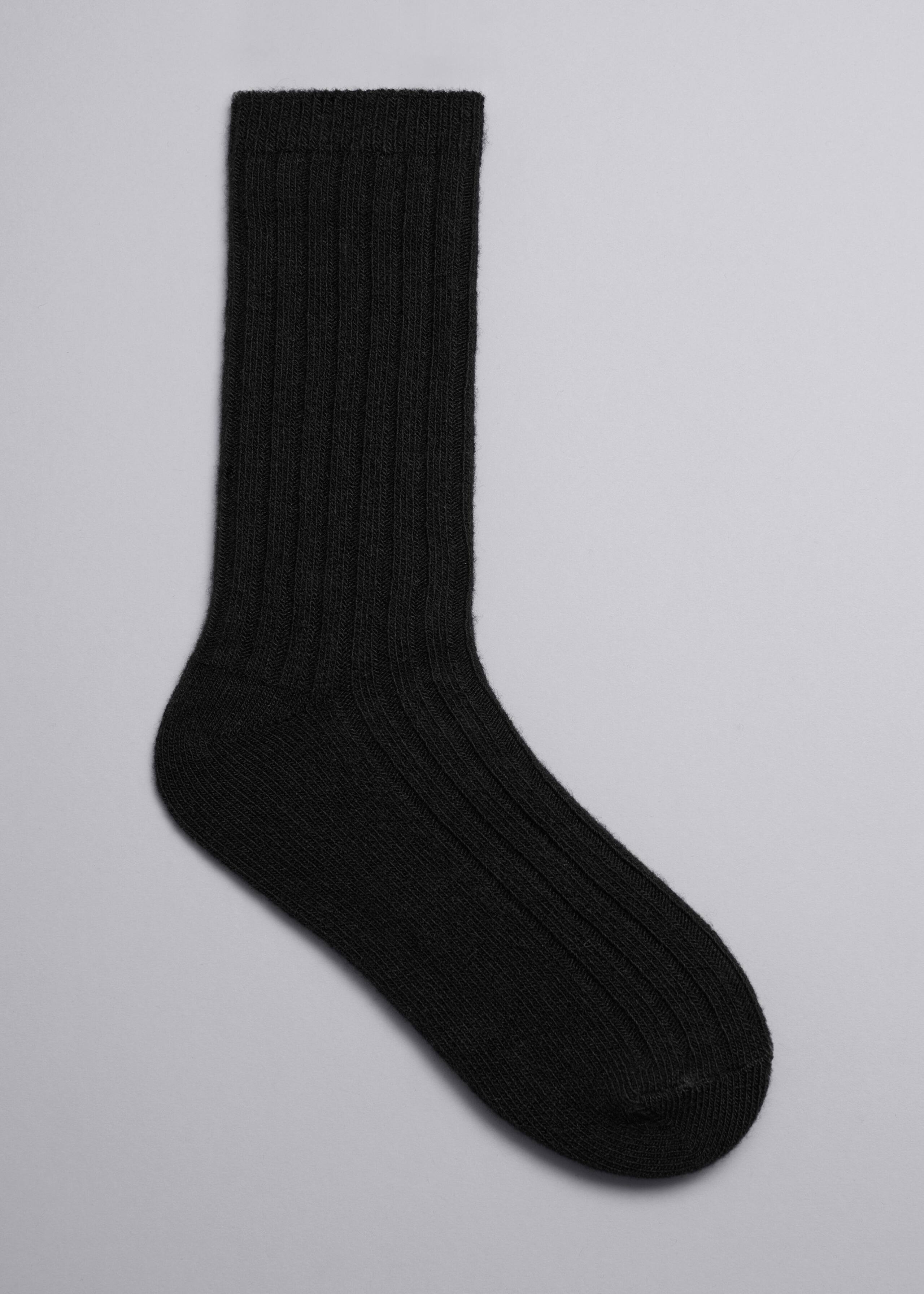 Mjuka ullstrumpor – Olivgrön – stilleben