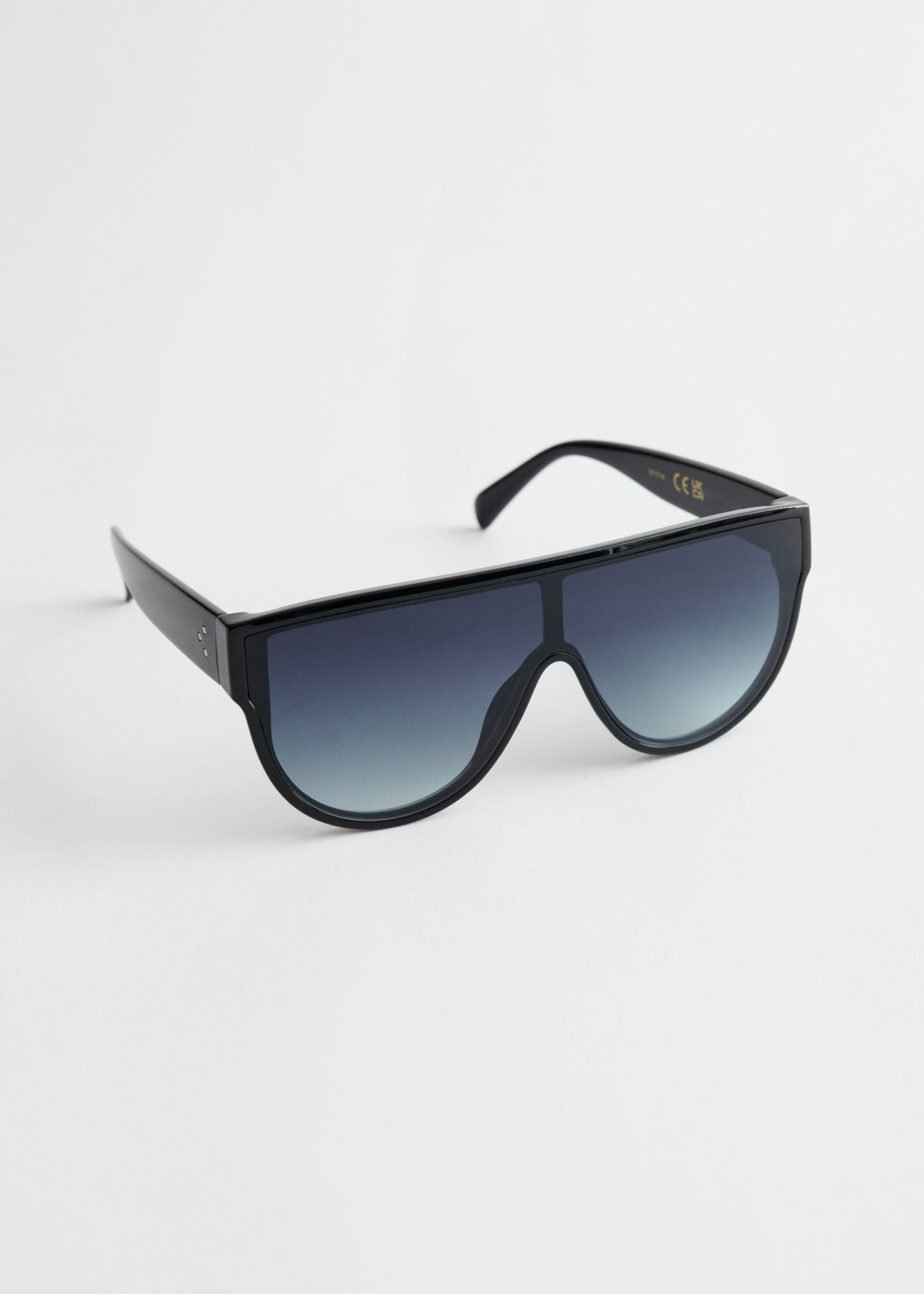 Shield Sunglasses - Black - Natura morta