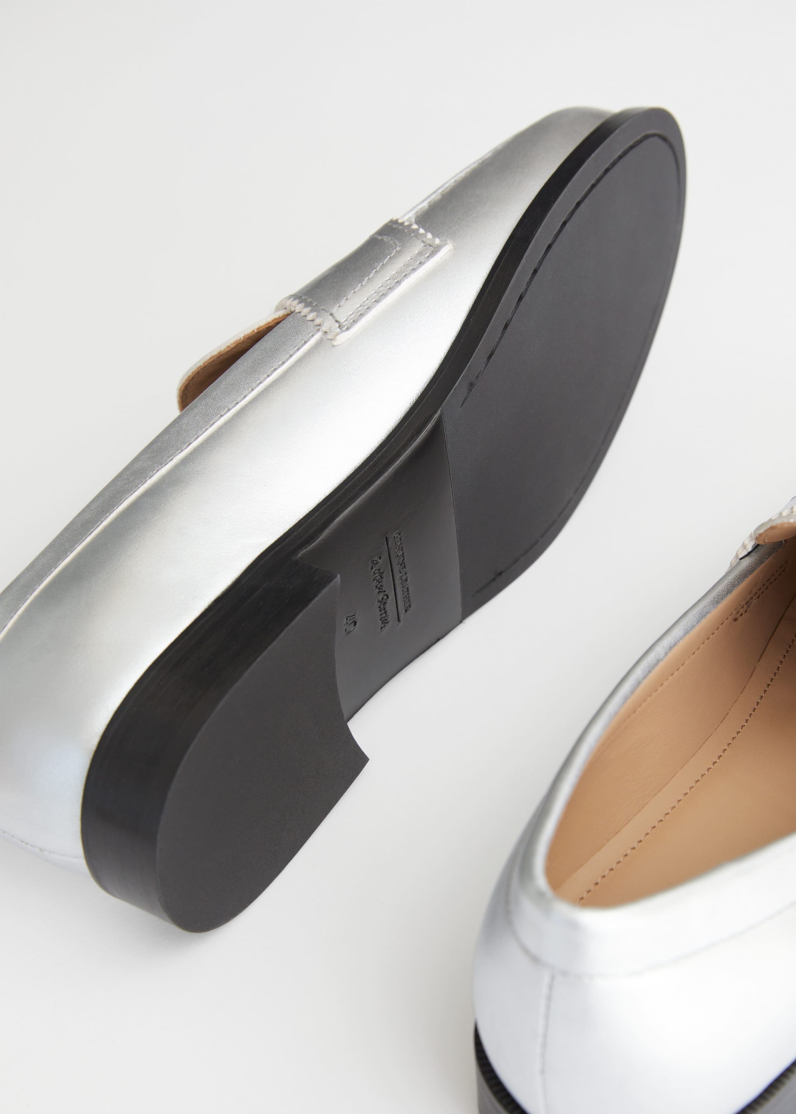 Leather Penny Loafers - {{variantName}} - Descrizione dettagliata