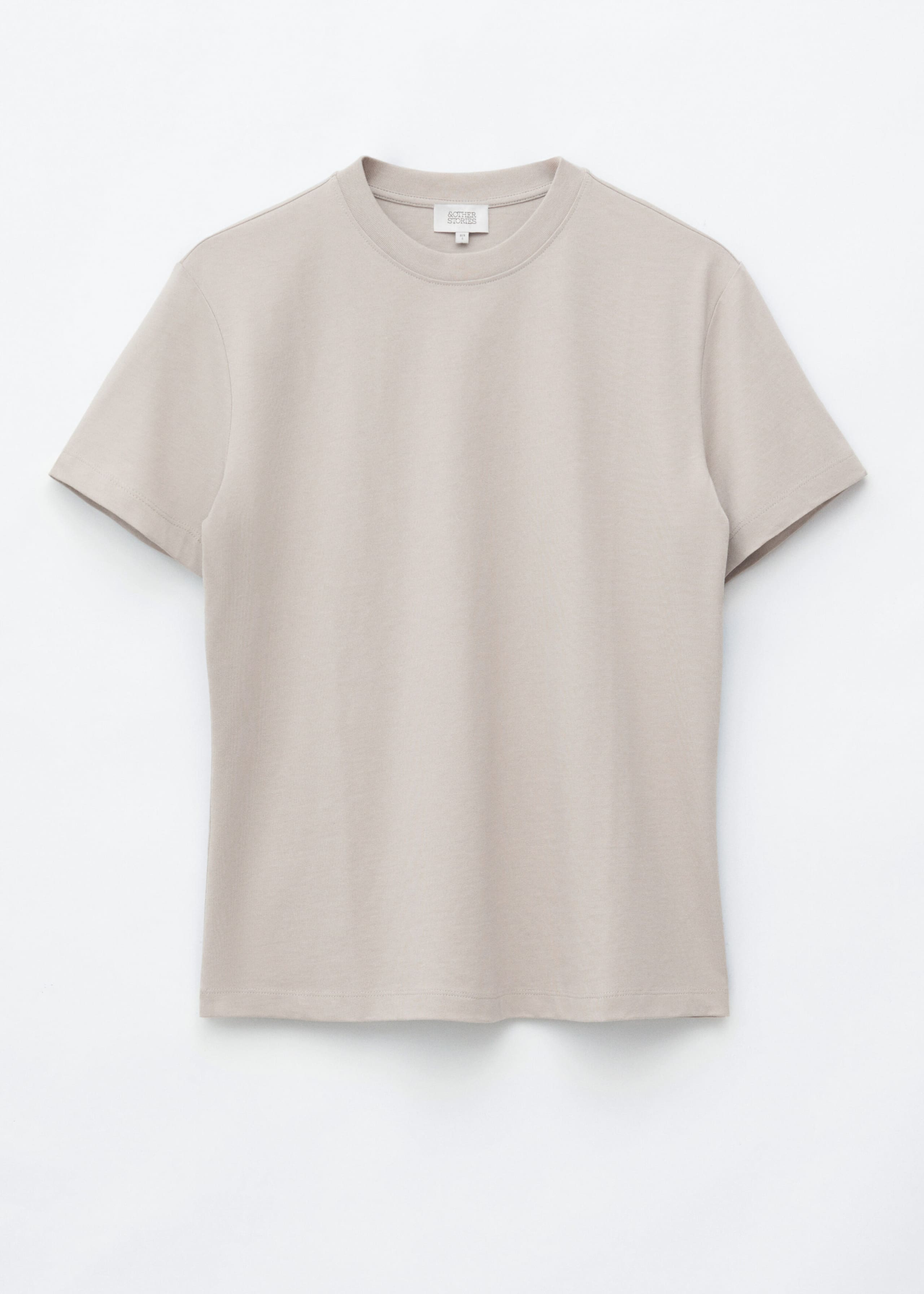 T-shirt i bomull med rund hals – Ljus mullvad – stilleben