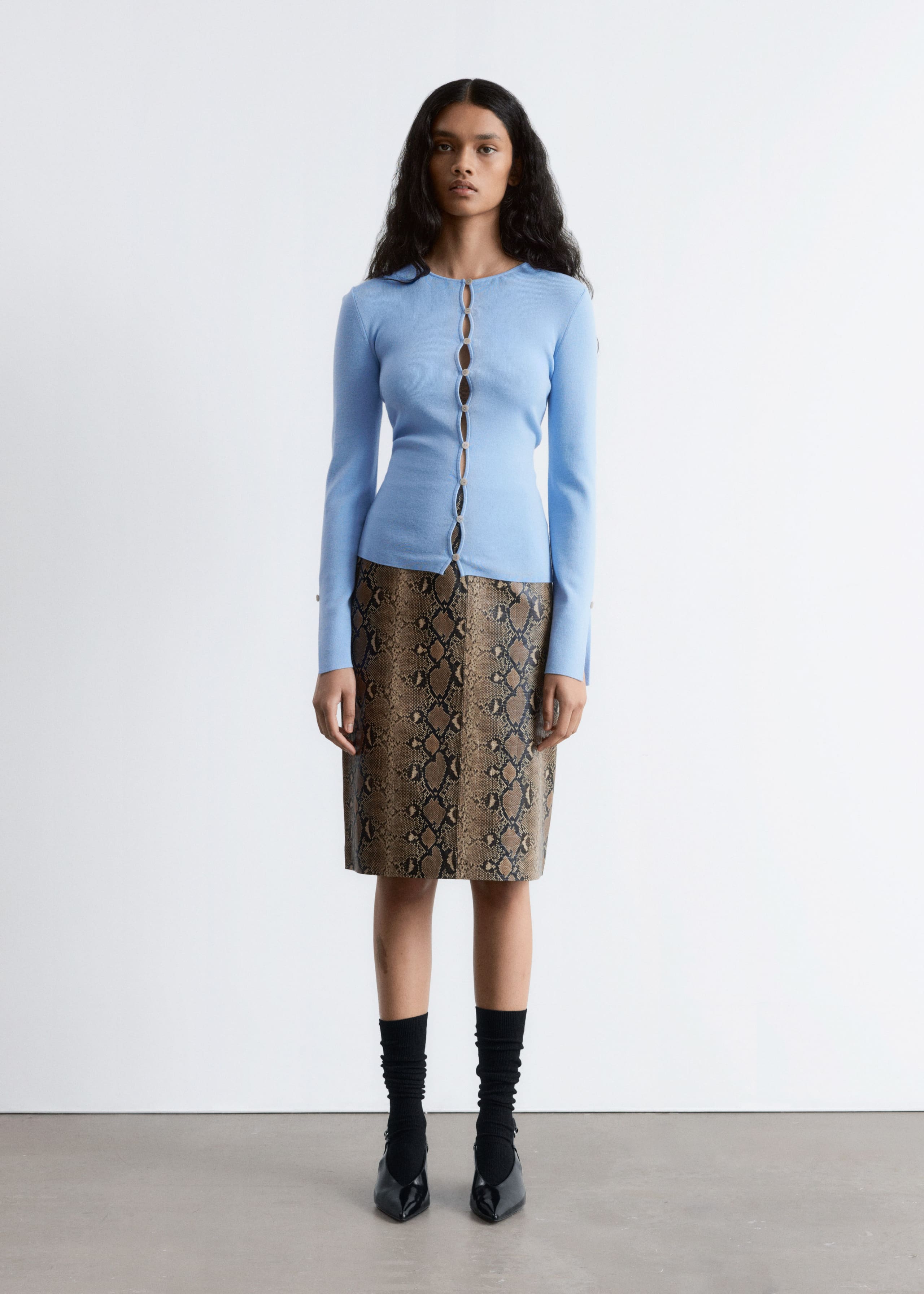 Image of Cardigan aderente in lana