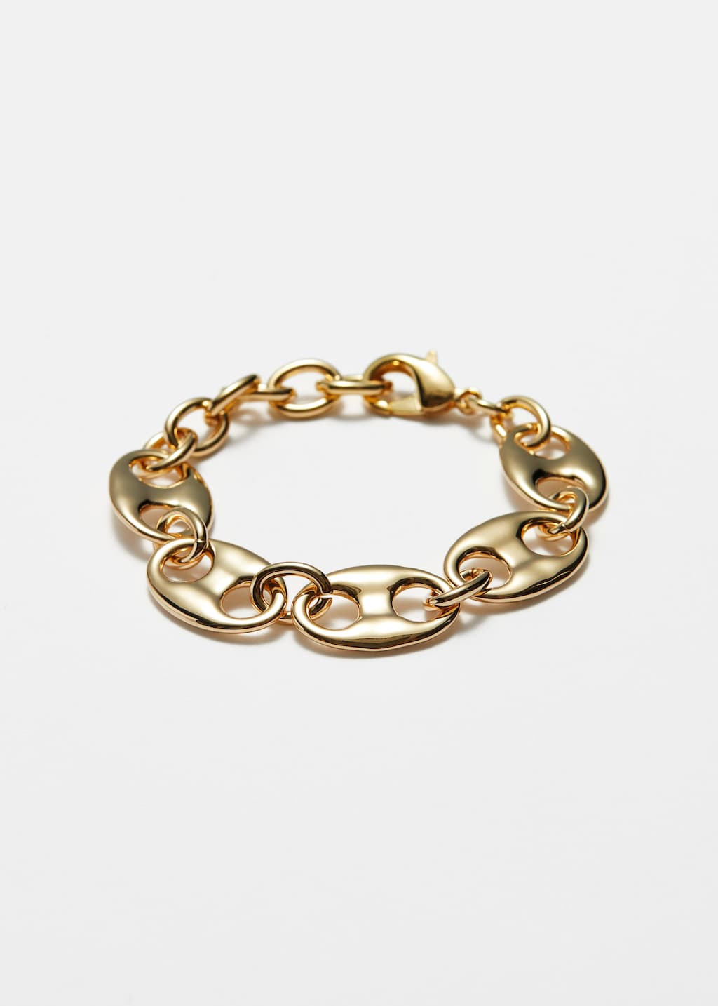 Skulpturalt armband – Guld – stilleben