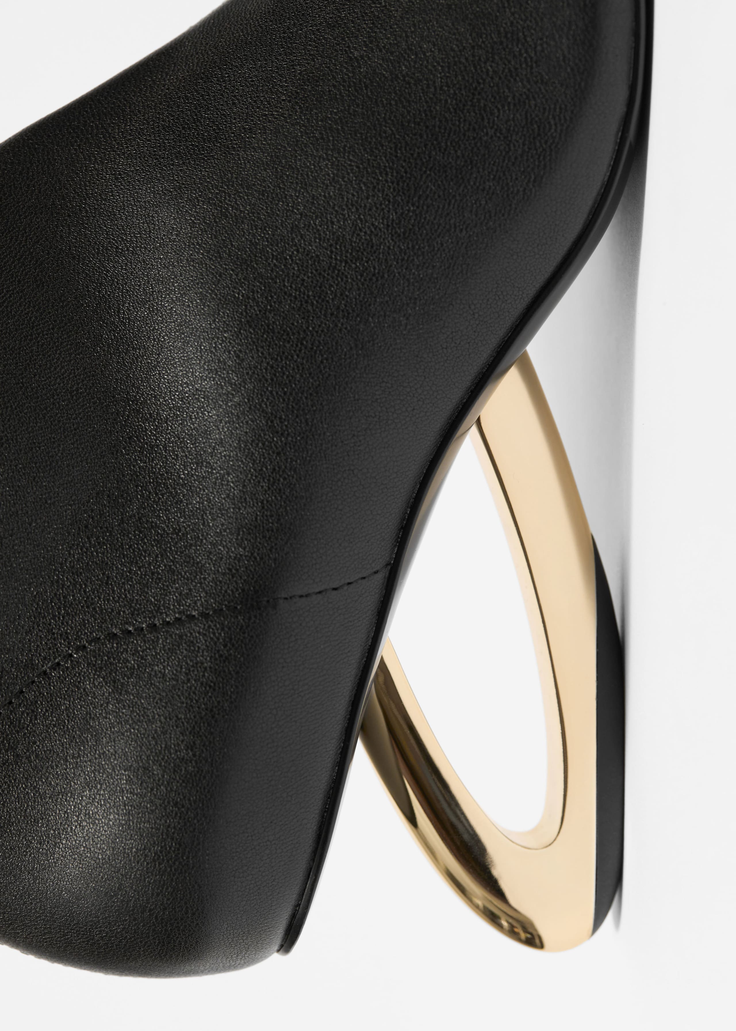 Sculptural Heel Ankle Boots - {{variantName}} - Descriptive Detail