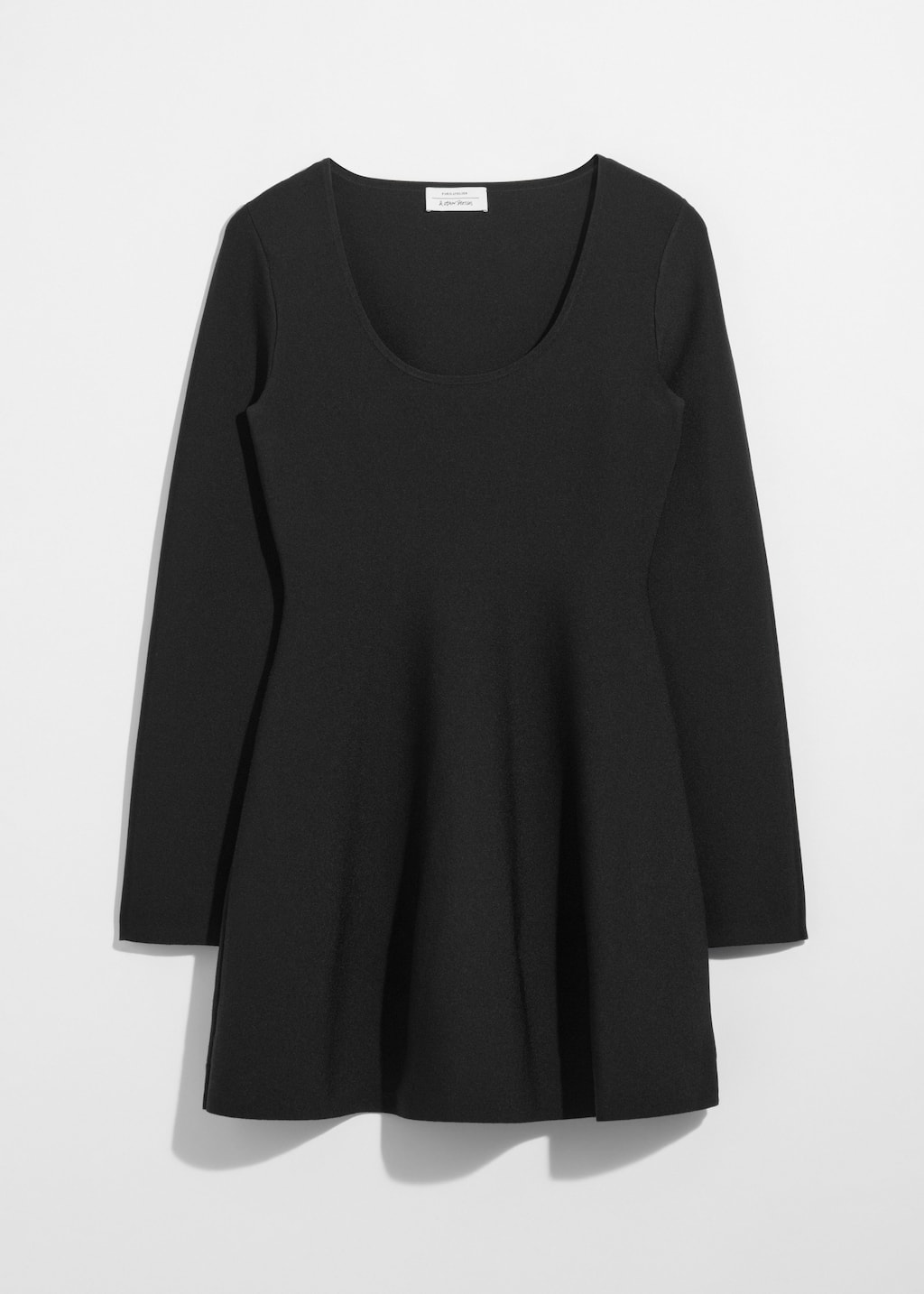 Image of Robe courte en maille à basque