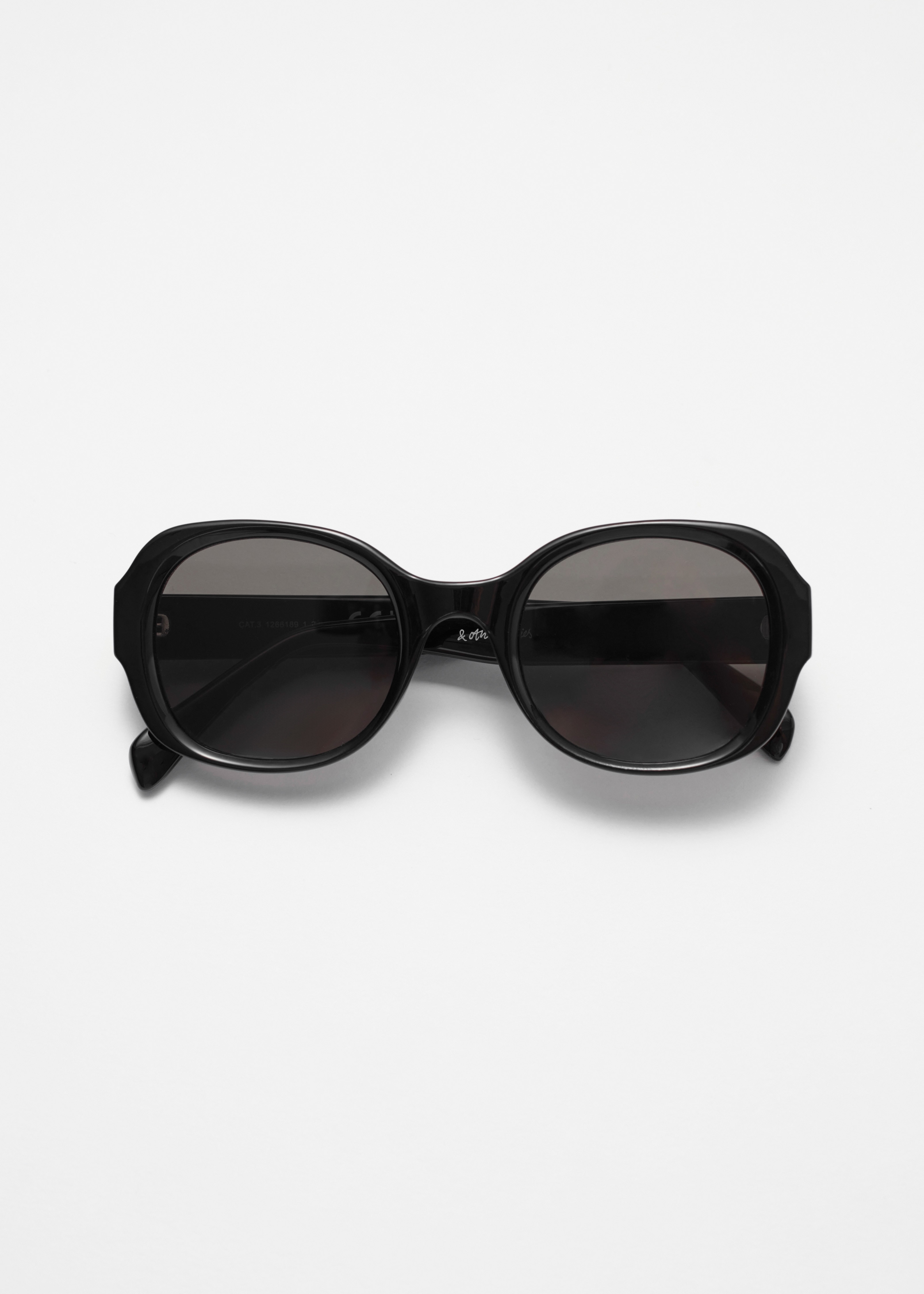 Sonnenbrille mit markantem, rundem Rahmen - Schwarz