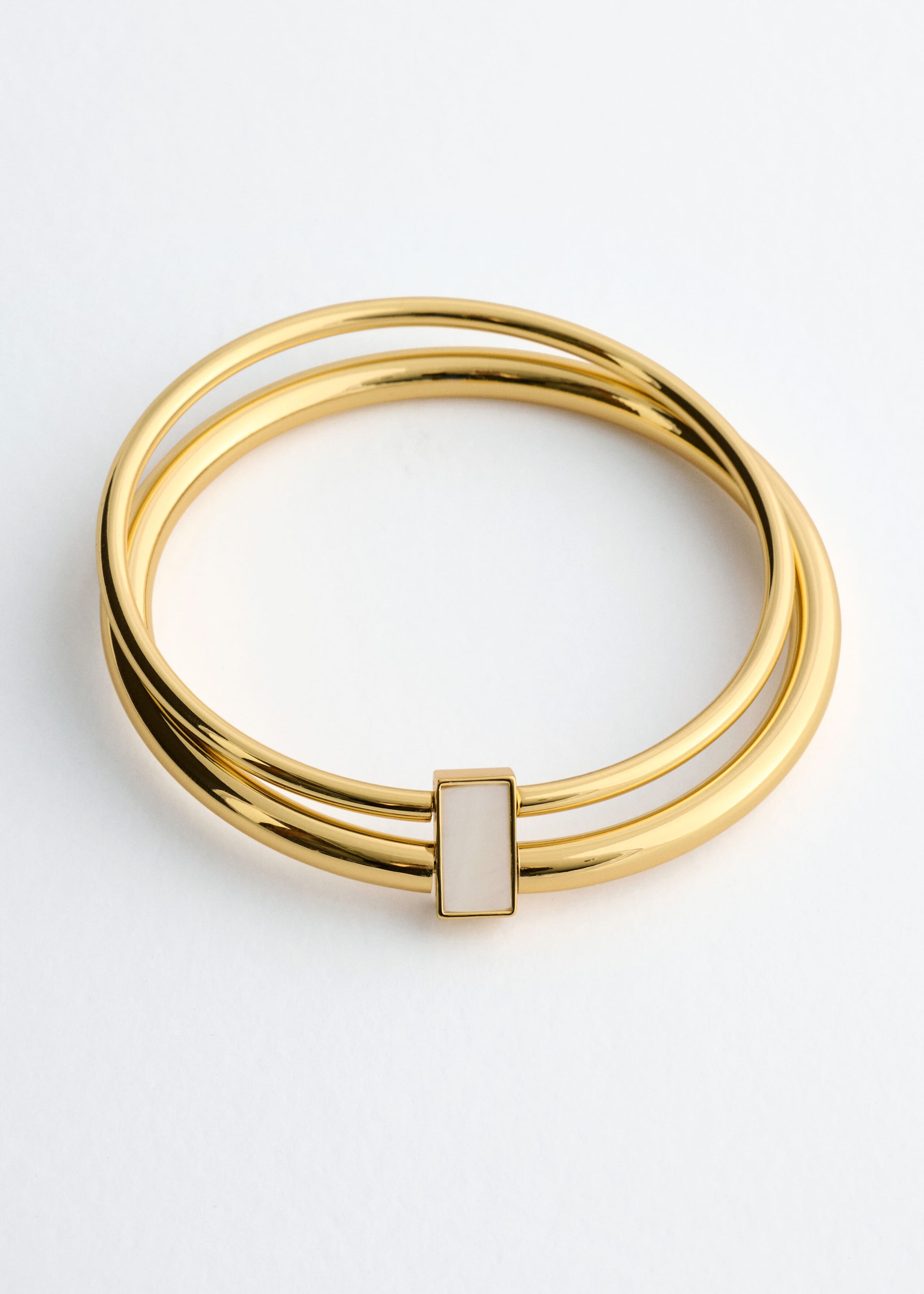 Double-Circle Brass Bangle - {{variantName}} - Descriptive Detail