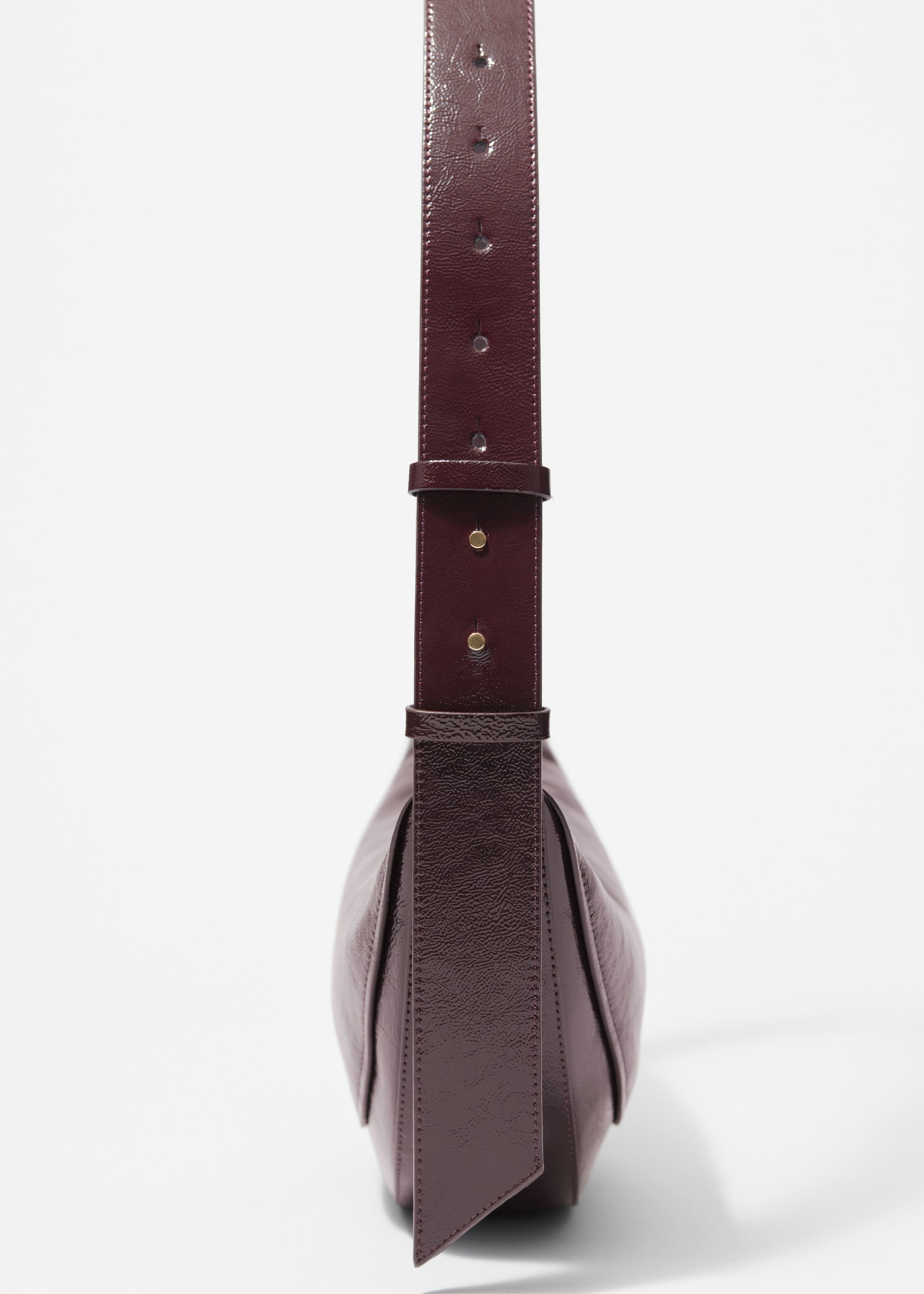 Borsa in pelle con pannelli - {{variantName}} - Descrizione dettagliata