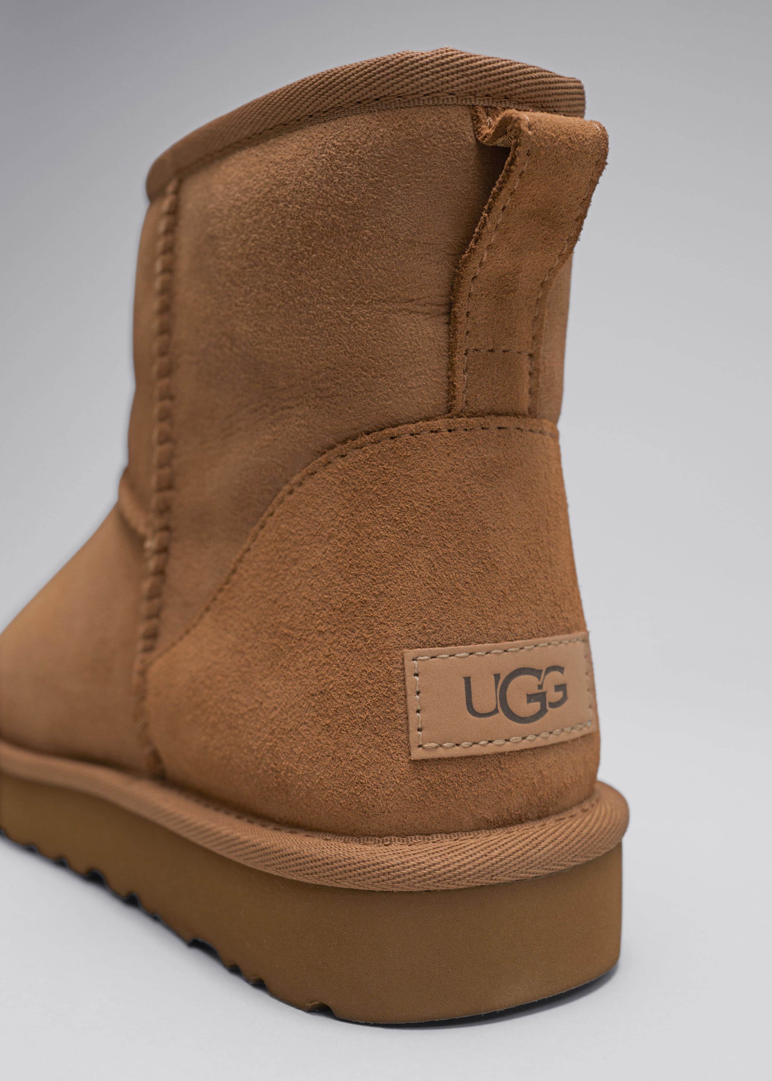 UGG® Classic Mini II Boots - {{variantName}} - Descriptive Detail