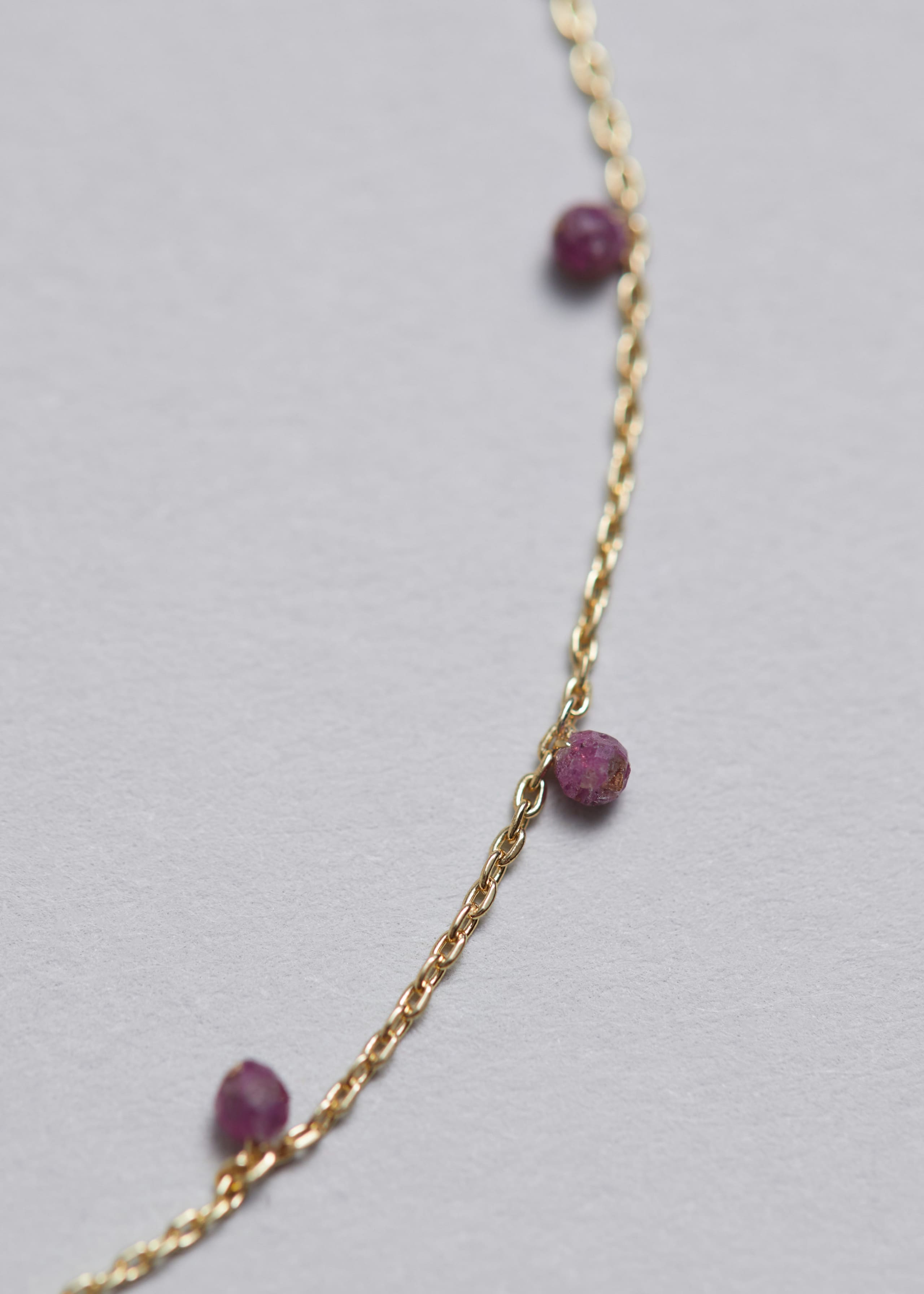 Bransoletka z wisiorkiem z kamieni szlachetnych – {{variantName}} – Szczegół