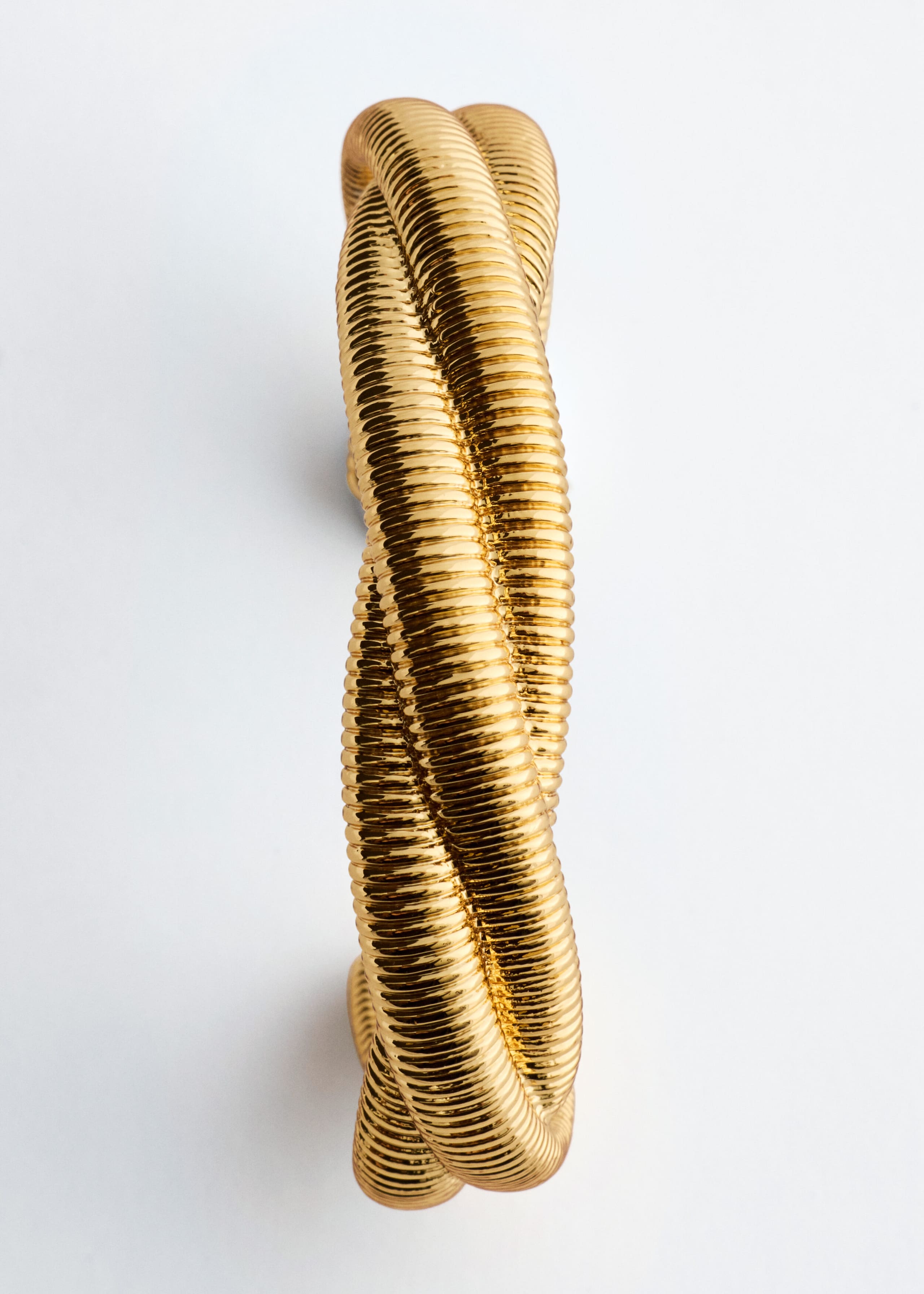 Plated Brass Twist Cuff - {{variantName}} - Descriptive Detail