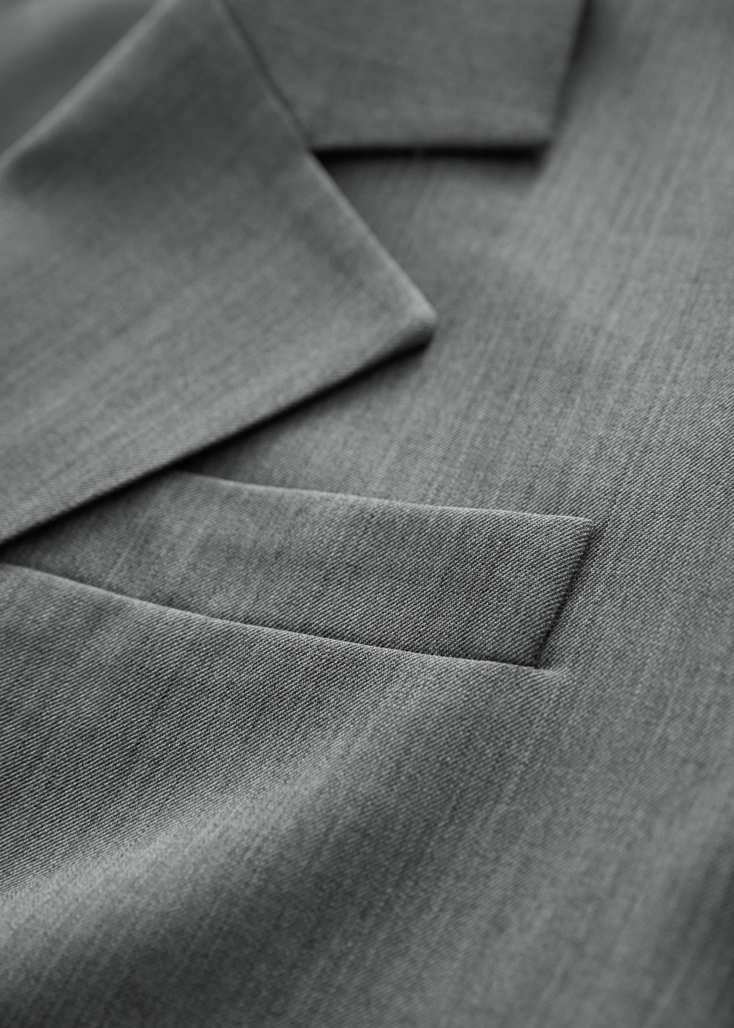 Einreihiger Blazer - {{variantName}} - Beschreibendes Detail