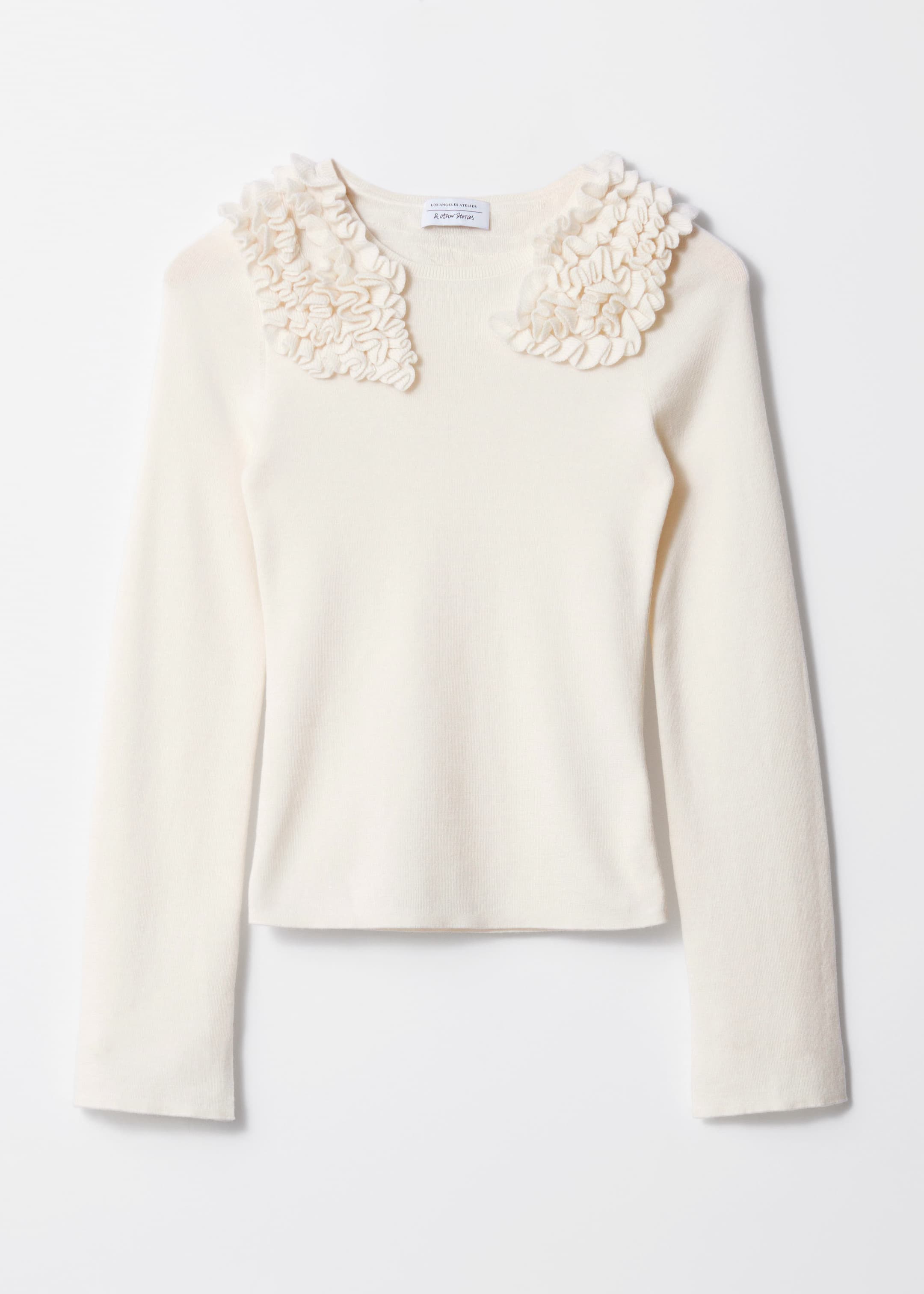 Visa större bild: Volangtopp i merinoullblandning - Crèmevit - DAM | H&M SE 1