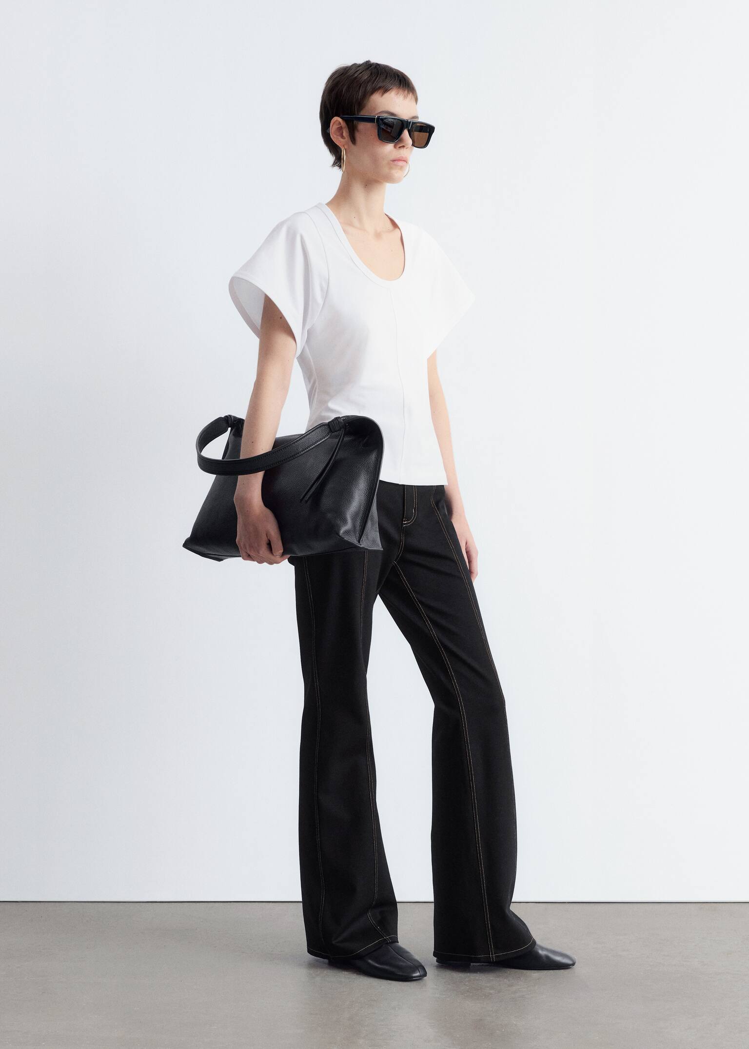 Pantaloni svasati impunturati - Nero