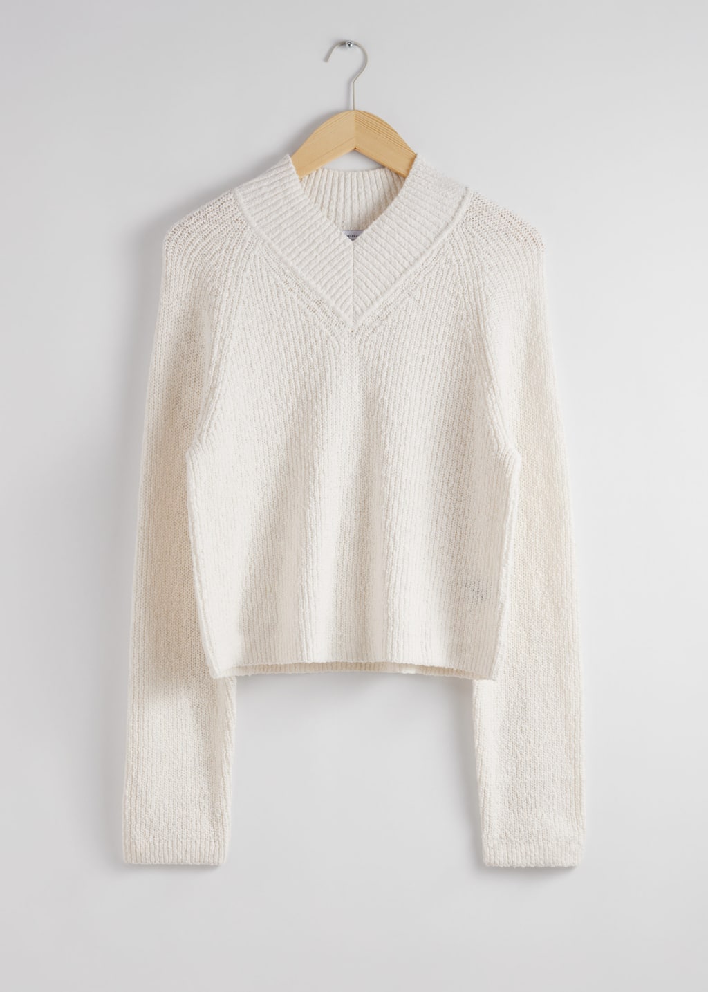 Jersey de punto con cuello de corte en pico