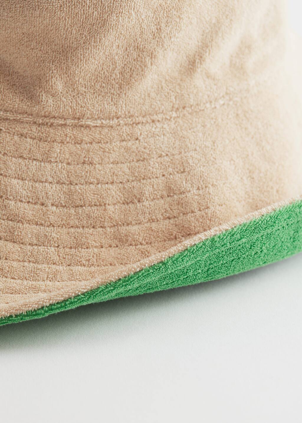 Reversible Bucket Hat - {{variantName}} - Detalle descriptivo