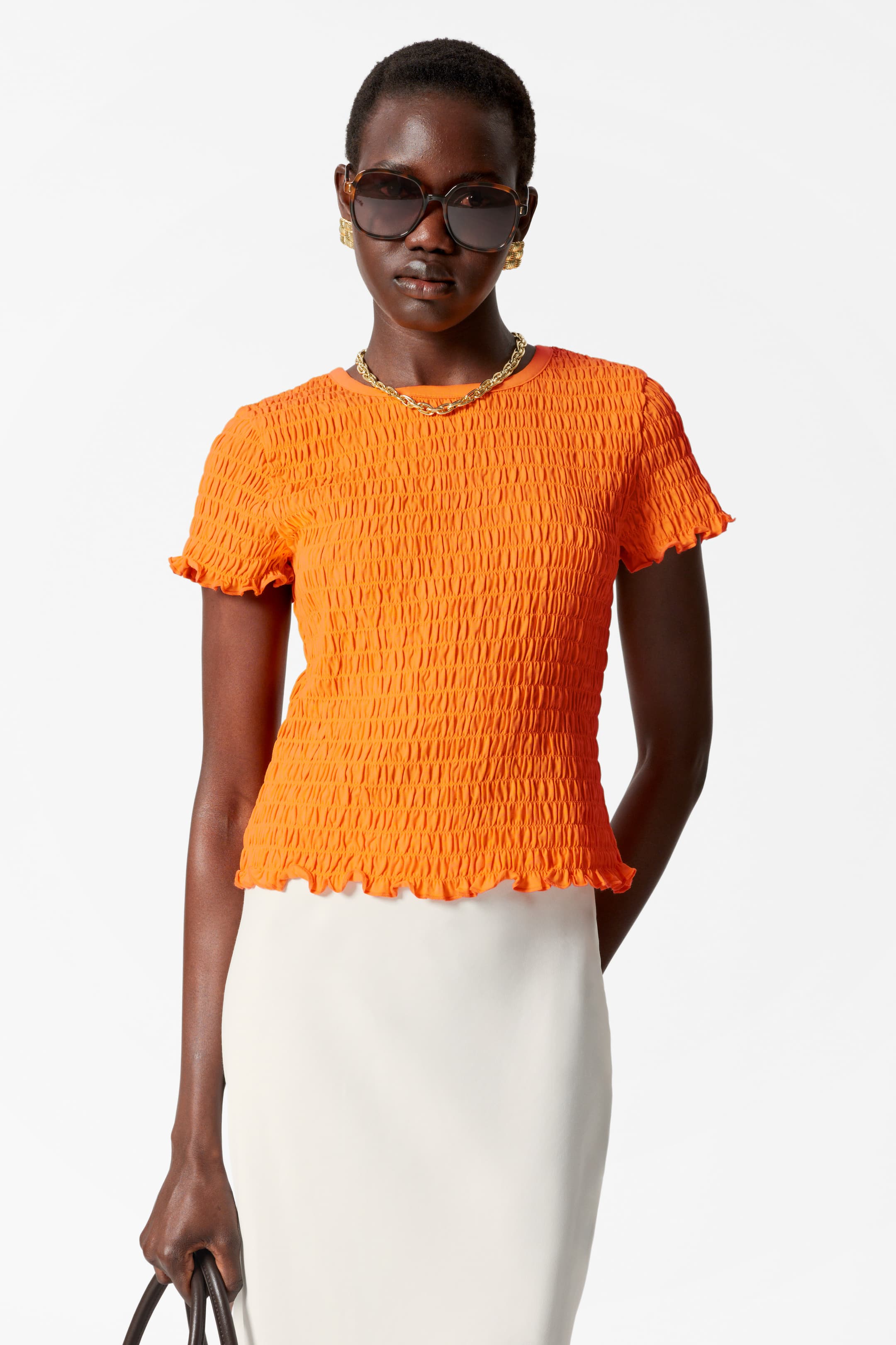 Zobrazit větší obrázek: Smocked tričko - Oranžová - ŽENY | H&M CZ 1