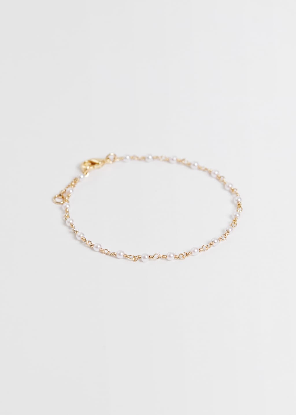 Pulsera de cadena de perlas diminutas - Oro - Bodegón