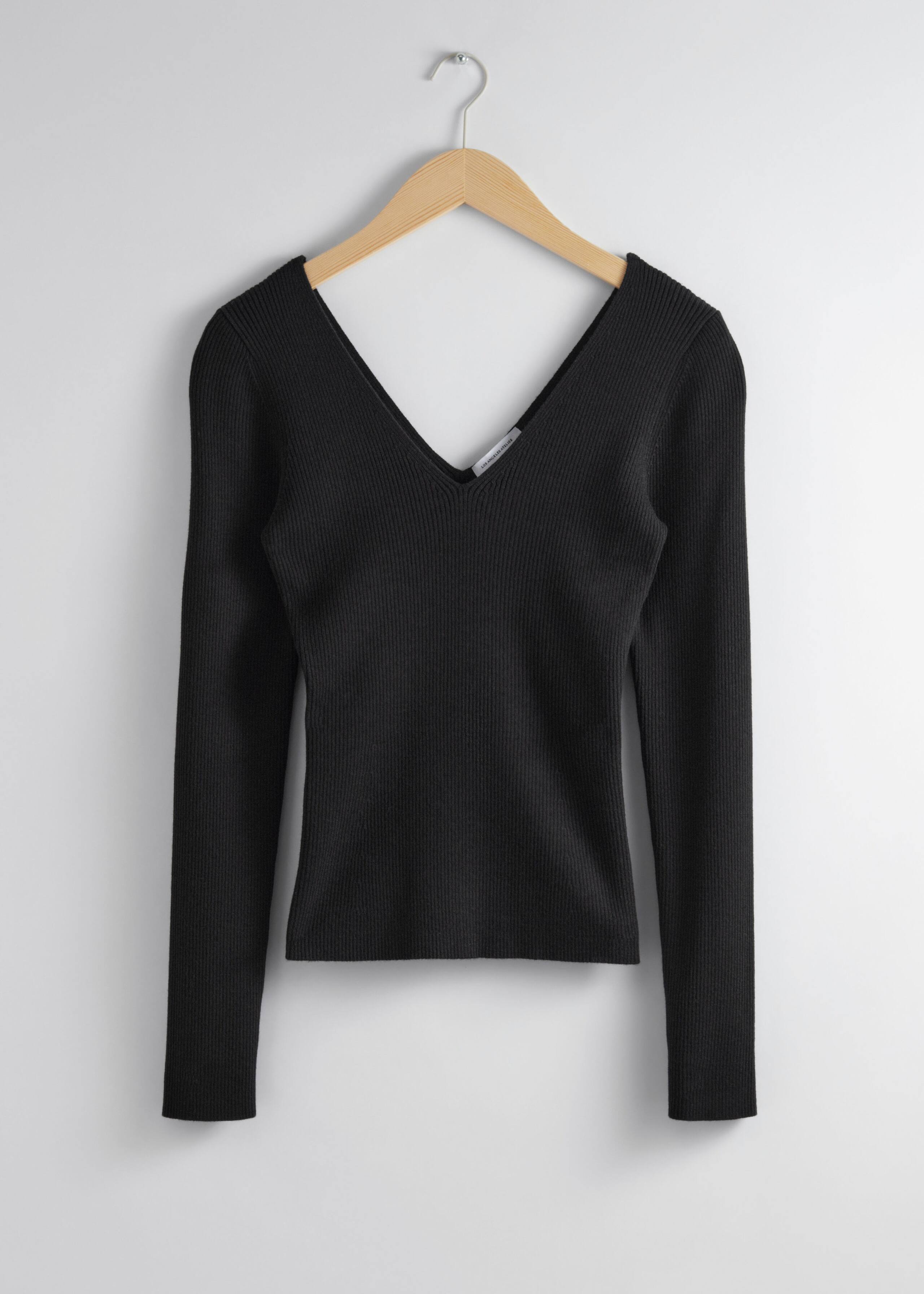 Maglia aderente con lavorazione a coste - Nero - Natura morta